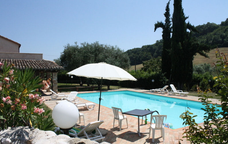 Agriturismo with pool , restaurant, campsite and tennis court.