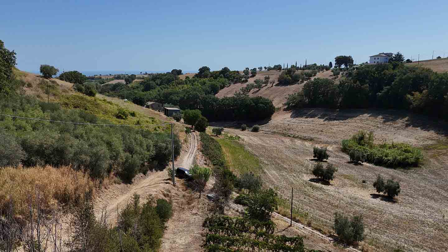 Stone country house in Massignano